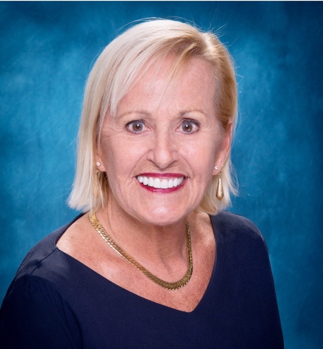 Linda McIlroy,  in St. Petersburg, Dennis Realty & Investment Corp.