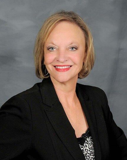 Marilyn O'Hare,  in Baton Rouge, Bessette Flavin