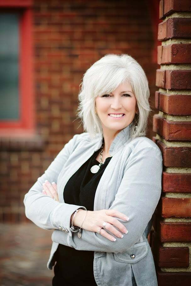 Ashleigh Collins,  in Minot, Action Realtors