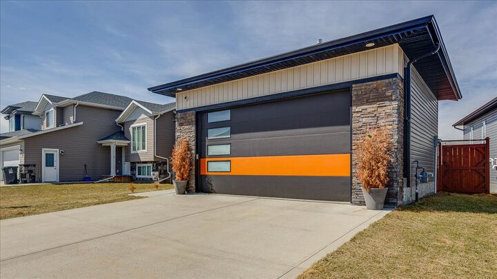 Property Photo: Exterior Front 738 Cypress Lane  AB T4S 0E5 