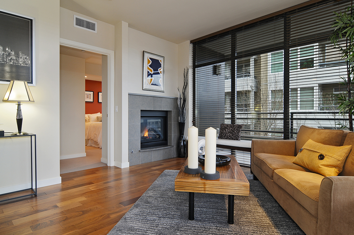 Property Photo: Living room and kitchen 10000 Main St 405  WA 98004 